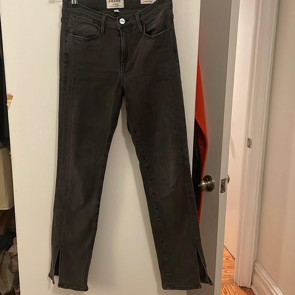 Black FRAME denim jeans with slits at ankles